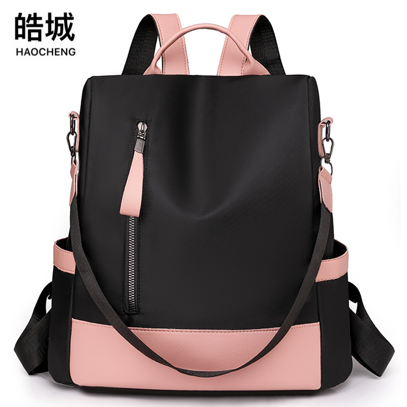 Venta al por mayor transfronteriza 2023 nueva mochila antirrobo de nailon casual moda femenina color de contraste bolsa de viaje al aire libre de doble uso