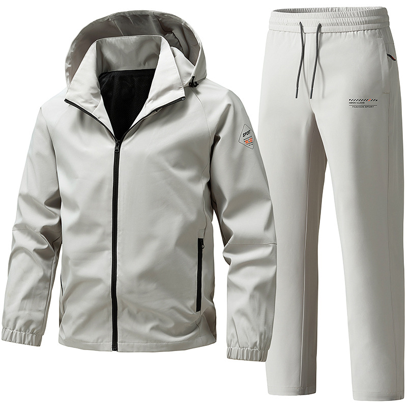 Trajes deportivos transfronterizos para hombres 2026 primavera y otoño sombrero desmontable chaqueta de asalto para hombres pantalones rectos de trabajo de dos piezas