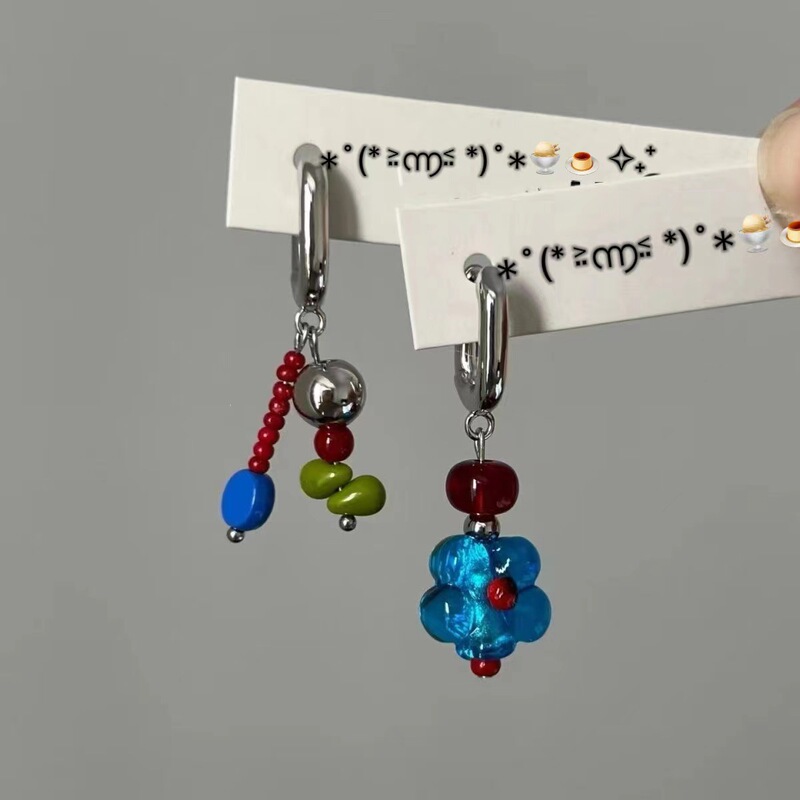 Send you a small blue flower asymmetric flower earring niche design high-end earrings slim Joker earrings