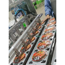 碗装泡面酸辣粉封口包装生产线全自动桶装杯装方便面封盖机