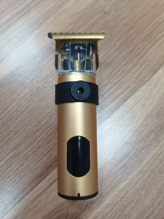 Corte de pelo eléctrico transfronterizo al por mayor retrógrado tallado impulsor eléctrico cabeza baldía de aceite impulsor eléctrico cortadora de plástico afeitar