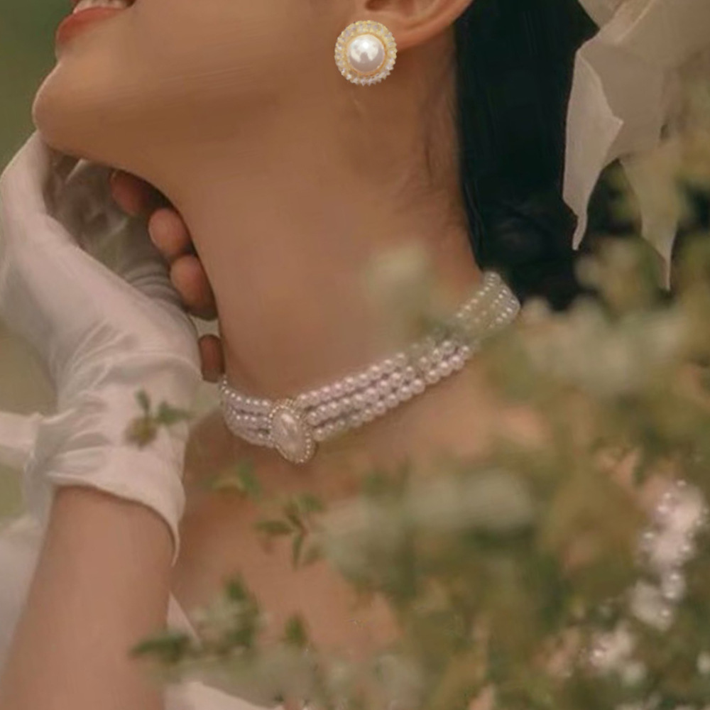 Luz de lujo simple retro oval Super Flash perla collar nupcial de las mujeres vestido de estilo francés vestido de novia pendientes de cadena de rendimiento