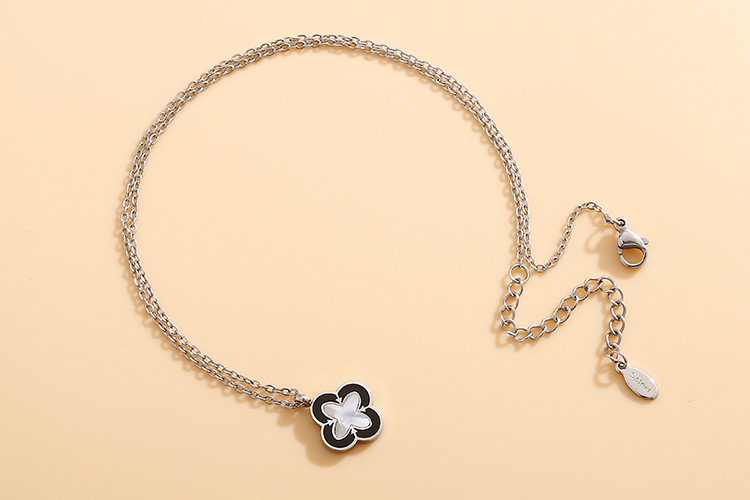 new clover black and white double-sided shell titanium steel vacuum plating 18k gold ladies jewelry 