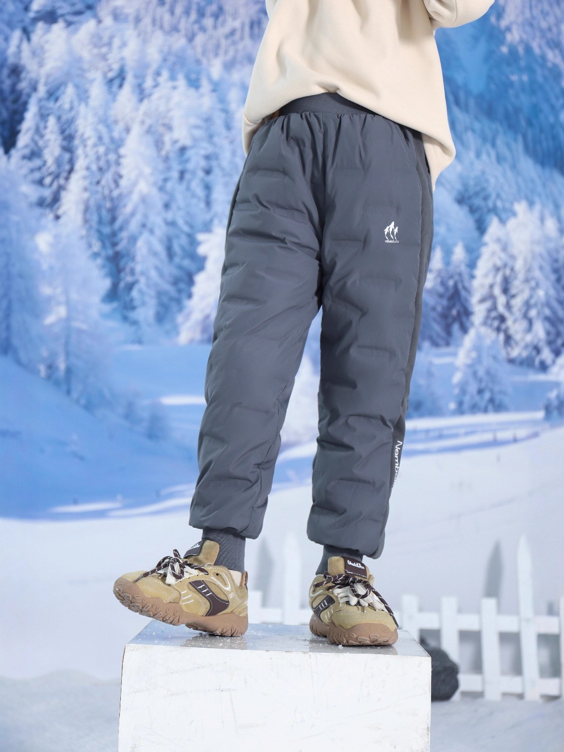 Pantalones de plumas para niños invierno nuevo 90 pantalones blancos de invierno tres pantalones de esquí de esquí de niños y niñas