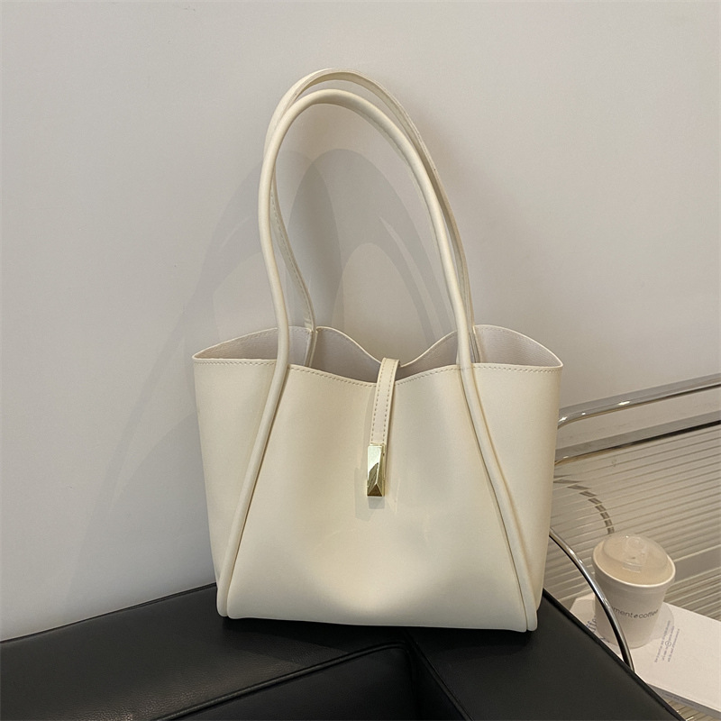 Bolso retro suelto de gran capacidad bolso femenino 2025 nuevo bolso de moda simple bolso de hombro minimalista bolso de axila