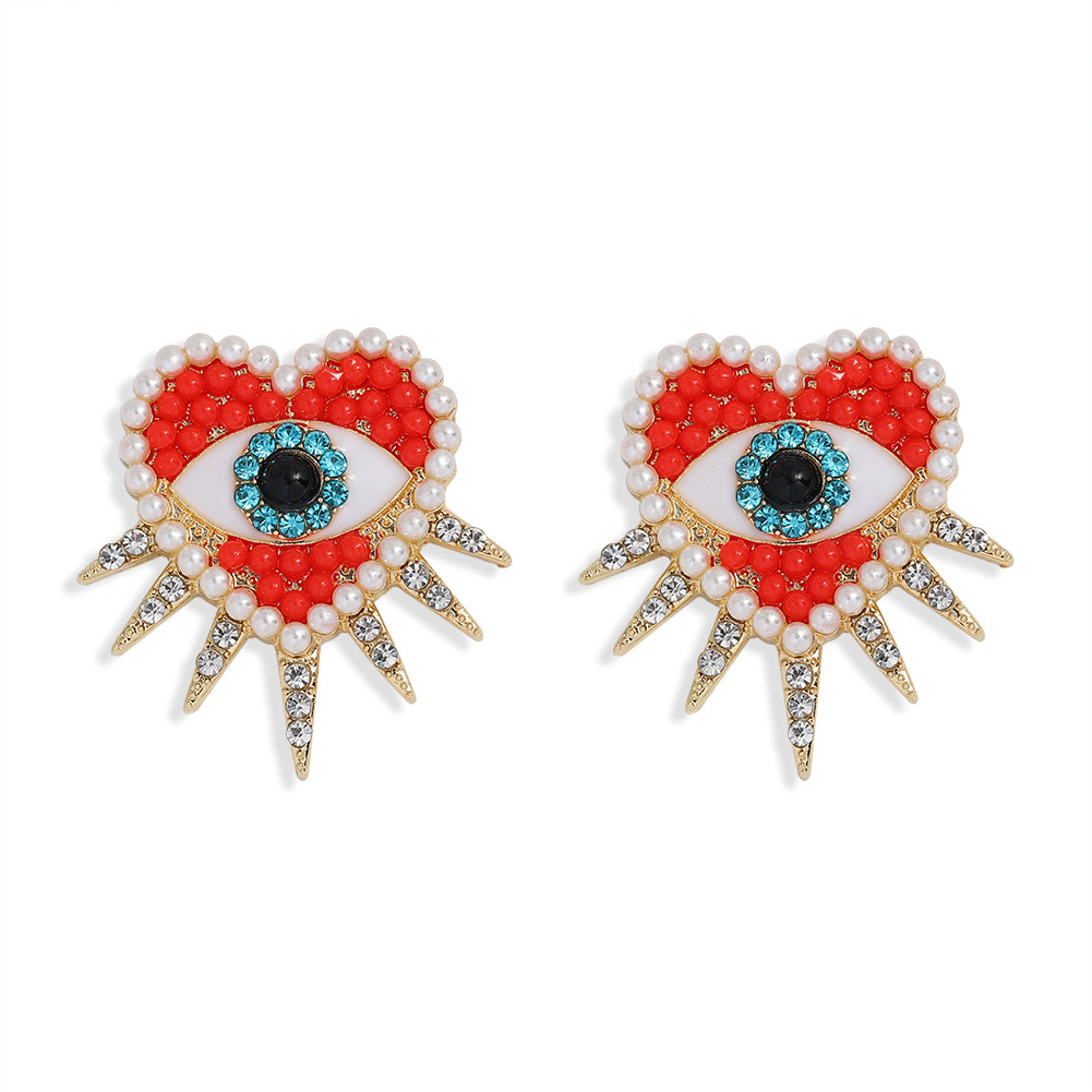 Fashion Demon Eye Heart Diamond Earrings display picture 2