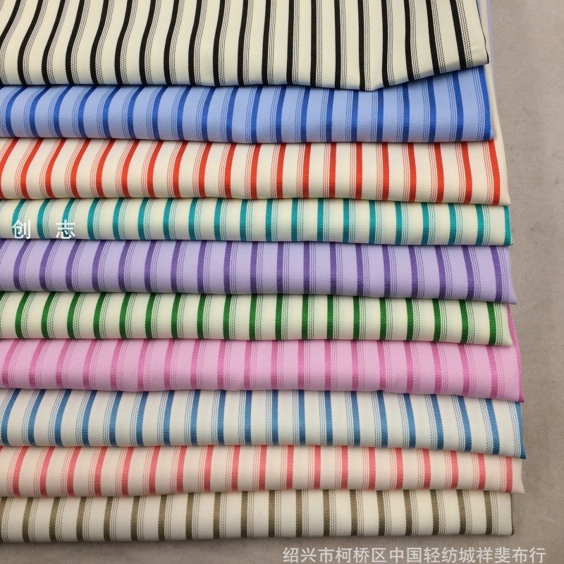 斜纹提花竖条子面料春夏女装衬衫休闲时装连衣裙梭织淘货插色布涤