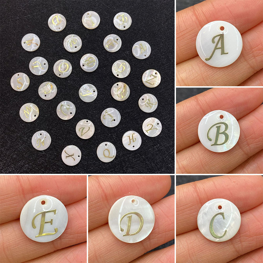 organic golden pendant with letters