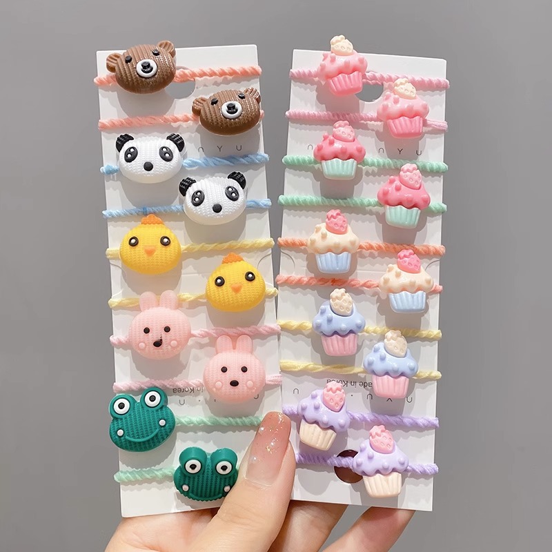 La cuerda del pelo del bebé de las muchachas de la banda de goma de los niños no lastima el pelo Los accesorios del pelo del pulgar del tamaño pequeño atan la banda de goma del pelo