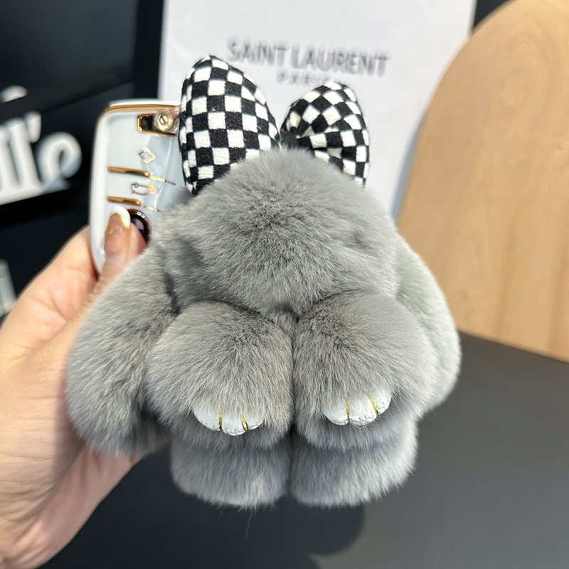 卸売りのかわいいウサギの毛の蝶結びの小さいウサギの自動車のキーホルダーはぬいぐるみのかばんを掛けて飾ります。