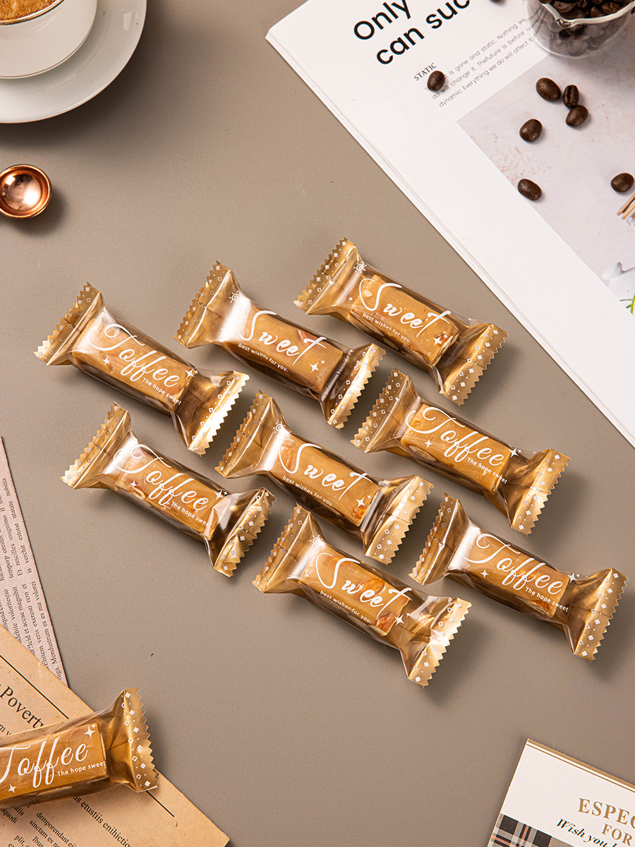 Nueva bolsa de embalaje transparente simple de caramelo de toffee nougat bolsas de sello de máquina de azúcar de café bolsas de sello de nieve crisp bolsas de sello independientes
