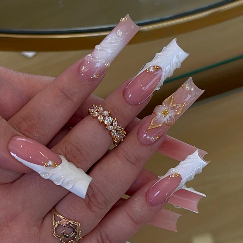 24 Pieces of Long Tube-Shaped Press-On Nails, White with Gold Embossed Floral Design, Handmade with Rhinestones, Nail Tips in Stock for Wholesale 24 Pieces of Long Tube-Shaped Press-On Nails, White with Gold Embossed Floral Design, Handmade with Rhinestones, Nail Tips in Stock for Wholesale
