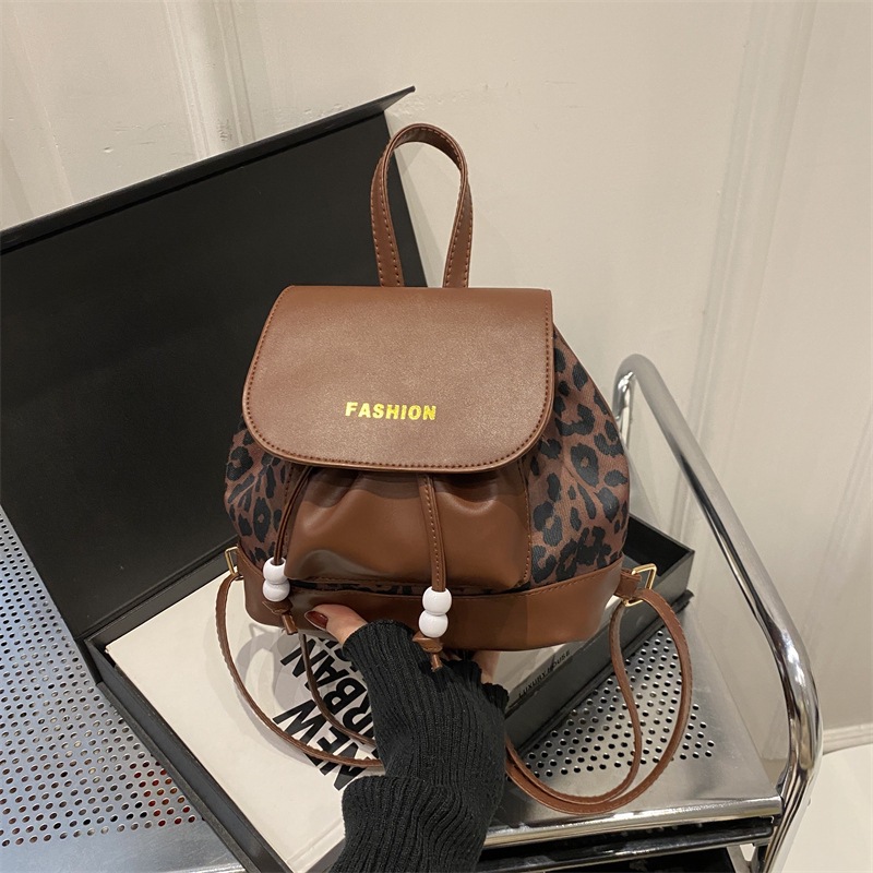 Bolso para mujeres 2025, nueva mochila retro de gran capacidad, moda casual, leopardo de otoño, bolso de hombro, bolso de mano