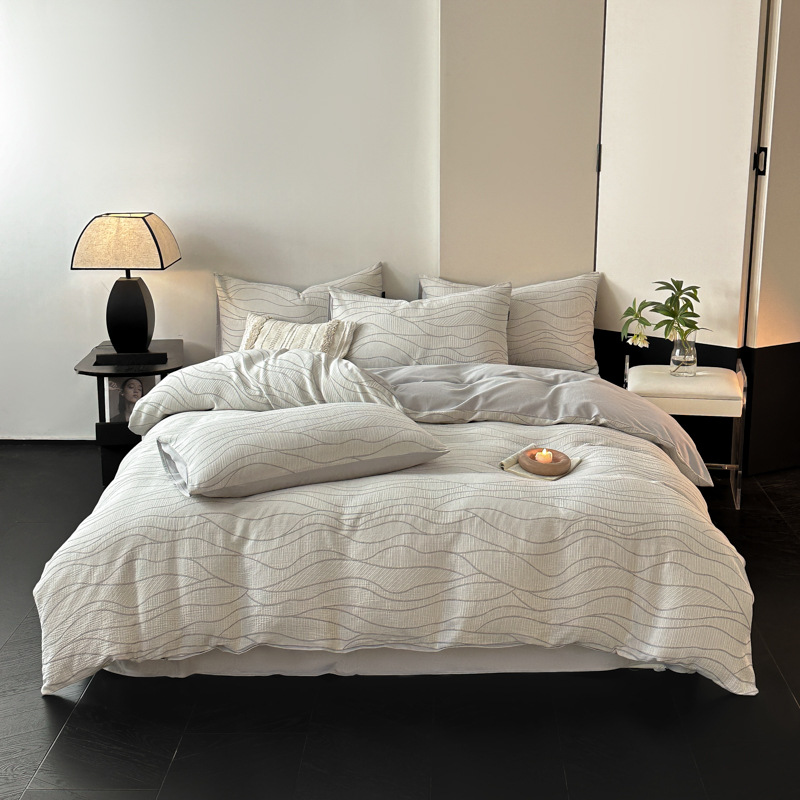 Una clase de madres y bebés de algodón molido cuatro piezas Nantong ropa de cama textil de algodón sábanas de cama cuatro piezas