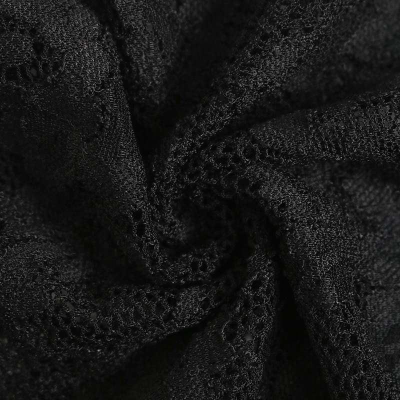 Tuta elegante nera in pizzo a maniche lunghe con inserti in mesh_voghion.com