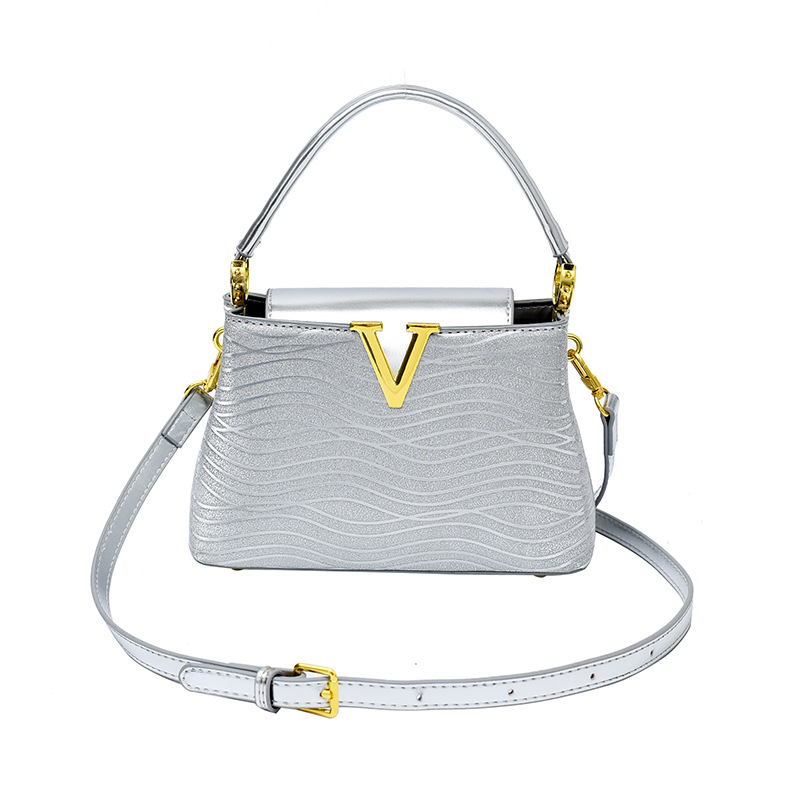 Bolsa de alta calidad de textura 2025 verano nuevo estilo bolso de hombro con patrón de ondas bolso de mensajero con patrón de serpiente de lentejuelas mujer