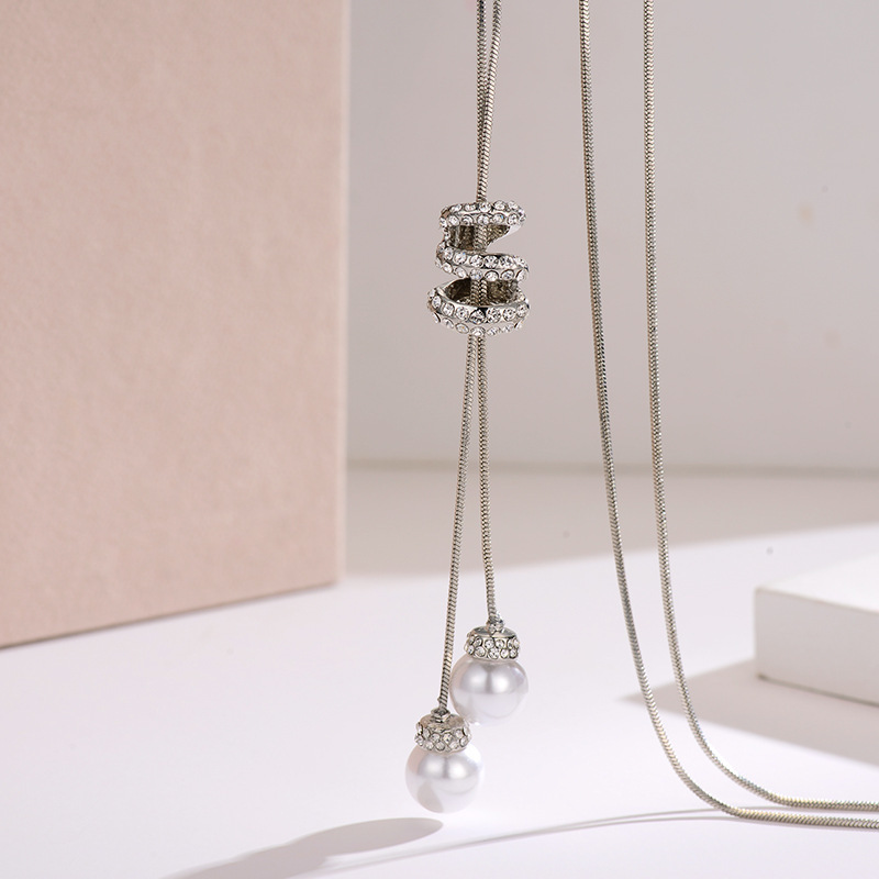 Estilo japonés y coreano envuelto en la cintura Cadena de suéter integral de alta calidad de las mujeres de todo fósforo de moda borla larga cadena de suéter joyería al por mayor