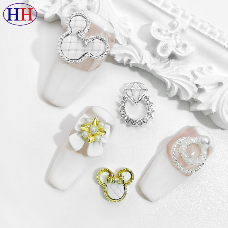 2024 nueva cabeza beige aleación rhinestone joyería de uñas mezclado lote pintura al óleo arco diamante anillo decoración de uñas al por mayor