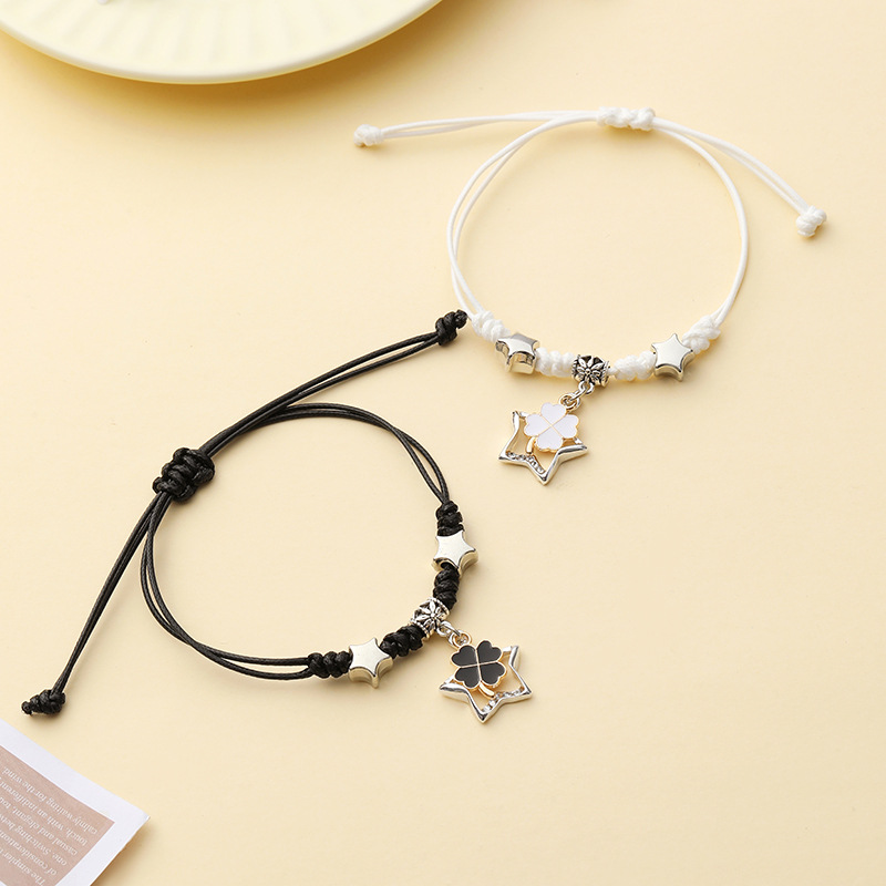 Pulsera pareja corazón hueco trenzada ajustable blanco negro_voghion.com
