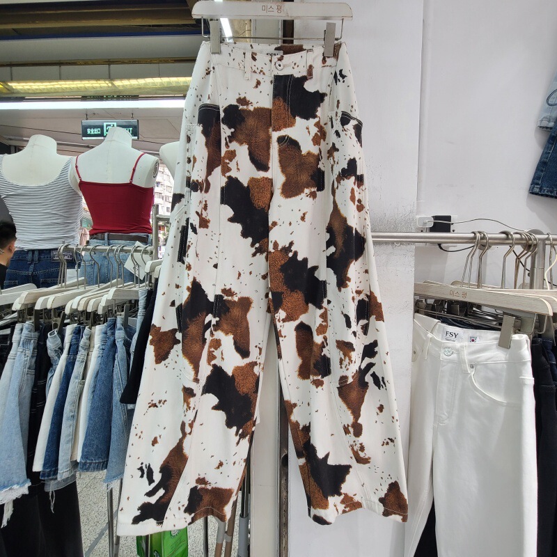 Fall 2026 high-waisted cow print casual pants with large pockets and slimming design, unique and stylish Fall 2026 high-waisted cow print casual pants with large pockets and slimming design, unique and stylish