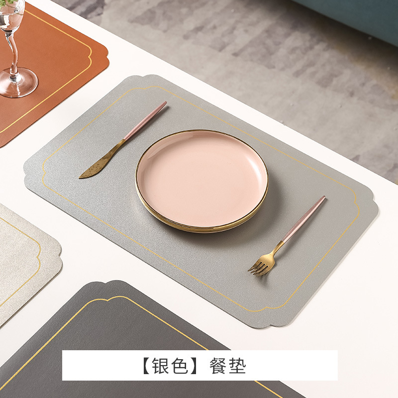 Estilo chino transfronterizo Ruyi Phnom Penh Mantel de cuero Mantel de mesa occidental de alta gama Alfombrilla de mesa redonda impermeable Mantel de hotel