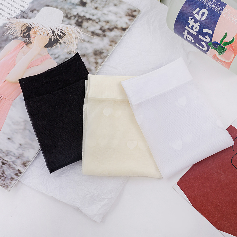 Calcetines flacos de las mujeres calcetines de verano Delgado transparente amor estudiante sexy hasta la rodilla de color sólido calcetines en blanco y negro al por mayor