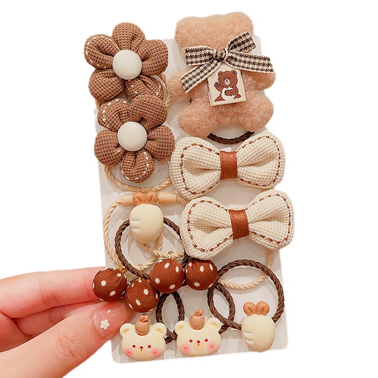 La banda de goma de la flor marrón de la leche de las muchachas de la venda de los niños no lastima el pelo banda elástica alta del pelo de la cola de caballo