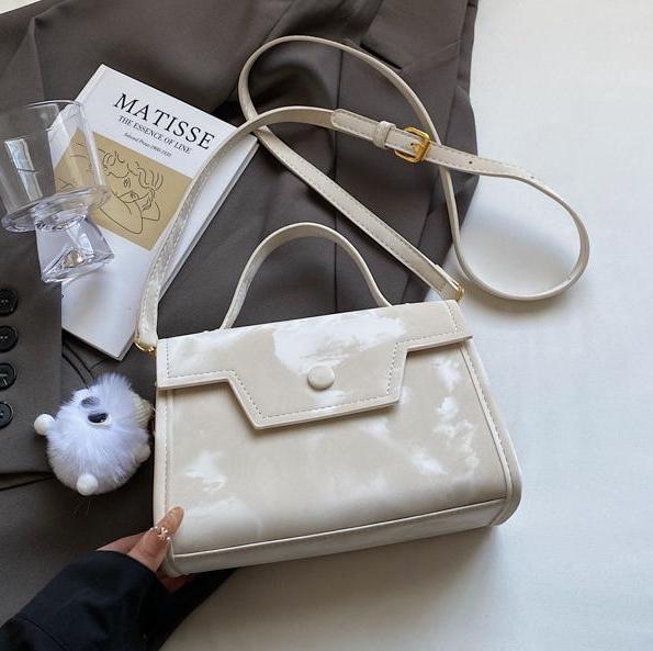 Bolso cuadrado pequeño de mano de estilo occidental de todo fósforo para mujer 2025 nuevo bolso de viaje de ocio ligero bolso de mensajero simple de sentido avanzado