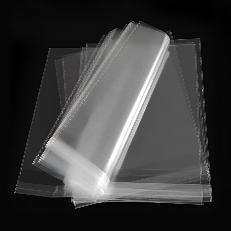 Bolsa autoadhesiva opp de stock de fábrica bolsa autoadhesiva bolsa de ropa de plástico bolsa autoadhesiva transparente bolsa opp con agujero