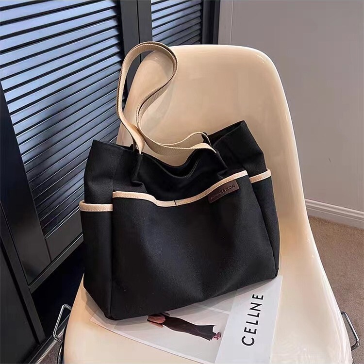 2024 new original large capacity solid color shoulder bag high-looking portable tutorial bag for college students for class commuting