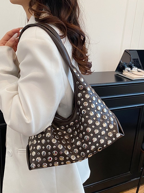 Bolso de mujer venta caliente nuevo nicho coreano Zhong remaches de gran capacidad bolso de alta calidad bolso de brazo de hombro universal