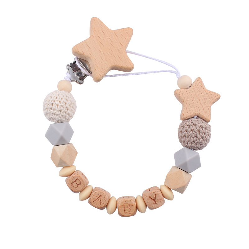 Nuevos productos para bebés abrazaderas de abrazaderas de haz de dibujos animados DIY pulsera de dientes molares decoración colgante de campana cuatro piezas