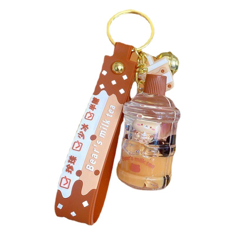 Perla leche taza de té oso colgante aceite flotante botella llavero femenino exquisito colgante mochila arenas movedizas colgante