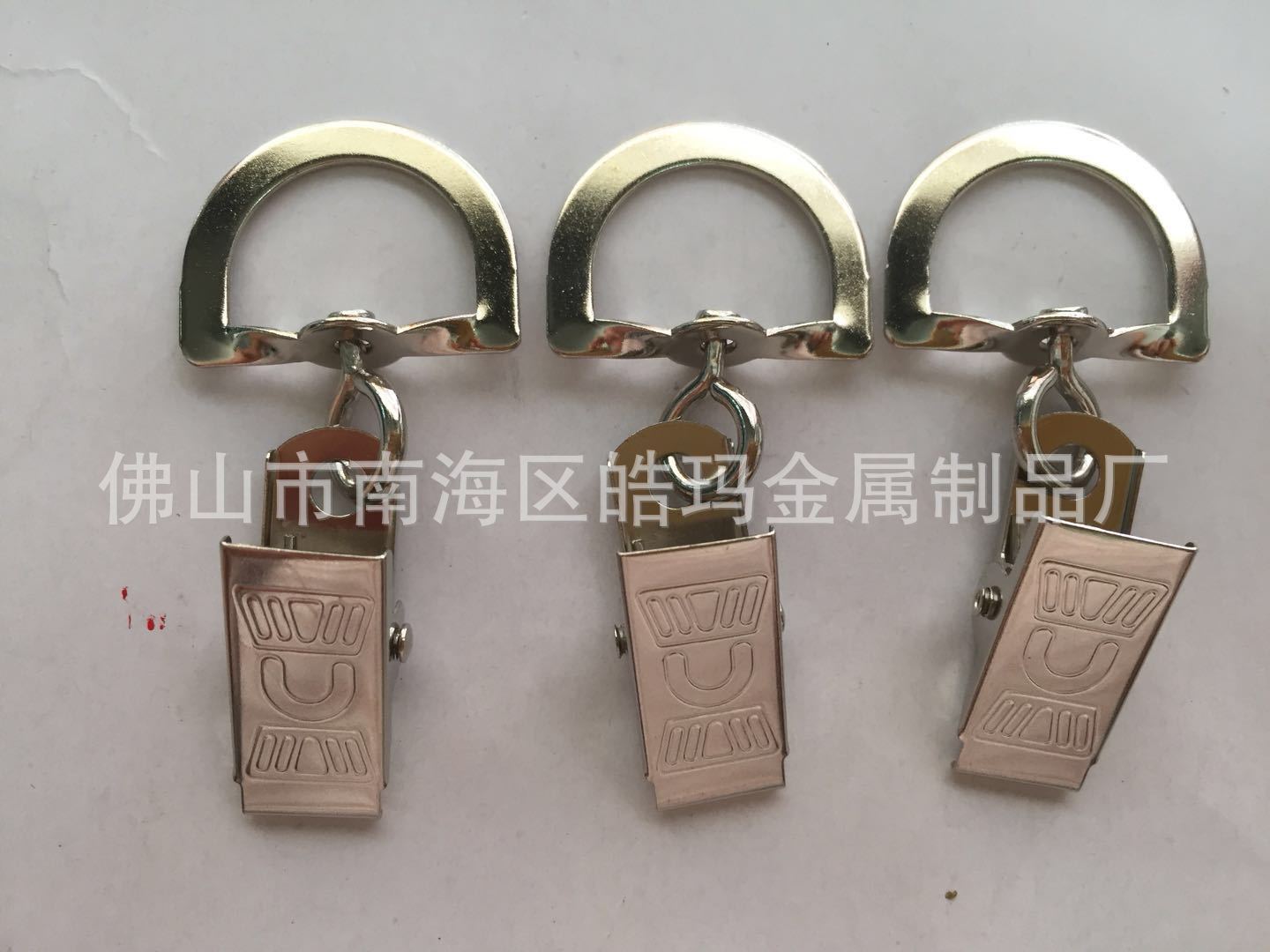 佛山皓玛厂家供应 铁皮配夹 挂绳旋转扣 8字扣 扭线夹尾巴内径20
