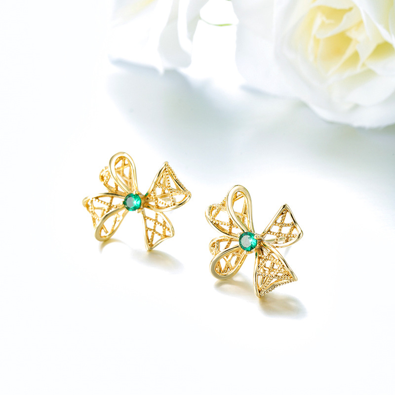 Xuping joyería nicho agujero arco pernos de moda personalidad incrustado aleación de cobre verde fría orejas para mujeres