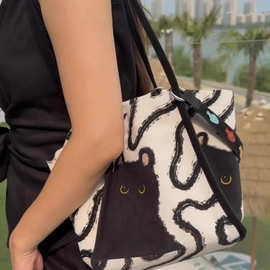 可爱卡通黑猫水桶包松弛感百搭单肩斜挎包潮韩系慵懒风帆布包包女