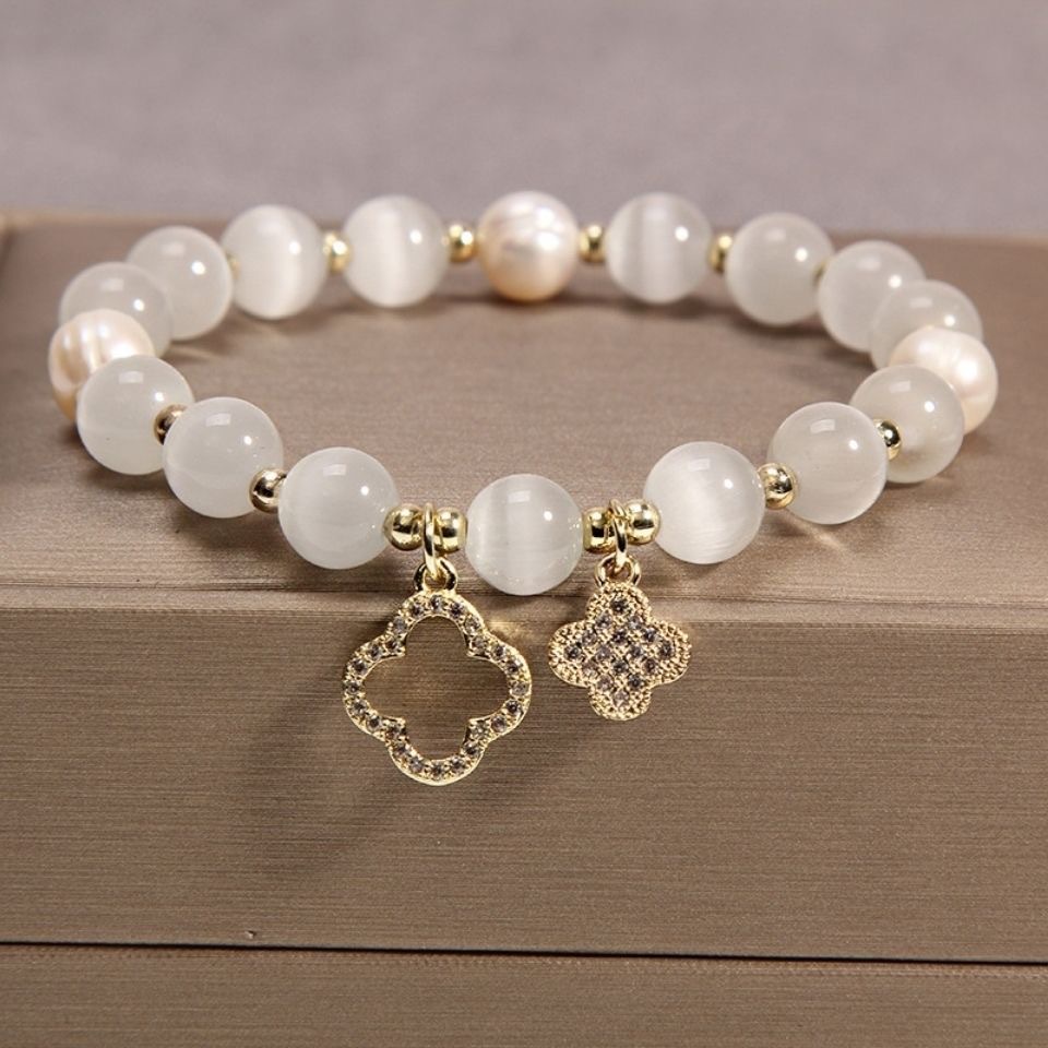 2025 nuevo ojo de gato piedra de cuatro hojas pulsera de vidrio pulsera de perlas de nicho