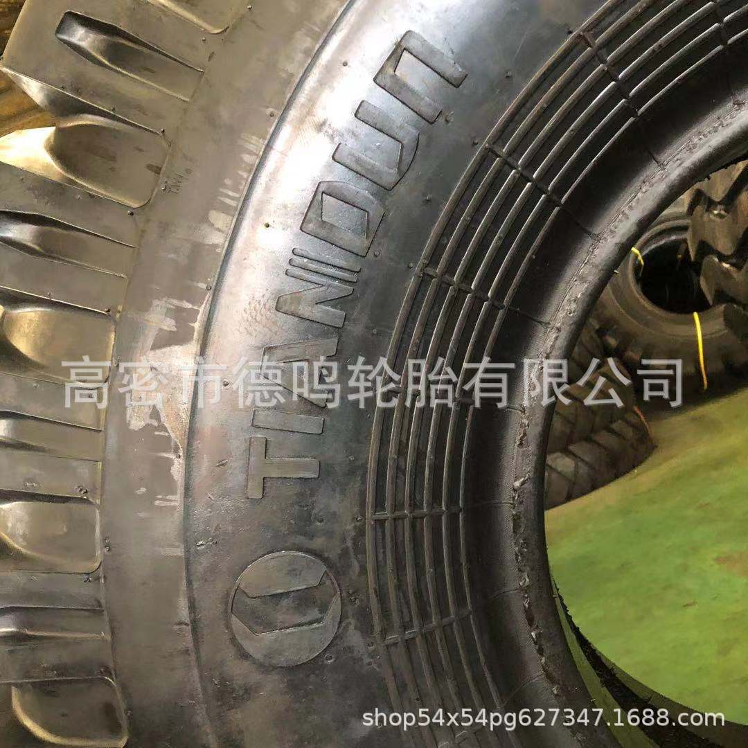 Suministro de neumáticos para minería de superficie lisa 18.00-25, neumáticos para maquinaria de construcción 1800-25, neumáticos para grúas portuarias.