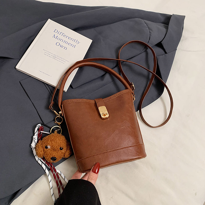 Niche Zhong retro coreano versátil bolso de cubo portátil de moda de mujer otoño y invierno viajero PU alta textura mochila