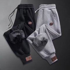 冬のベルベットの厚いスポーツパンツ男性の重いポンドのゆるい束の足の灰色のガードルの大きいサイズのカジュアルな秋のズボン