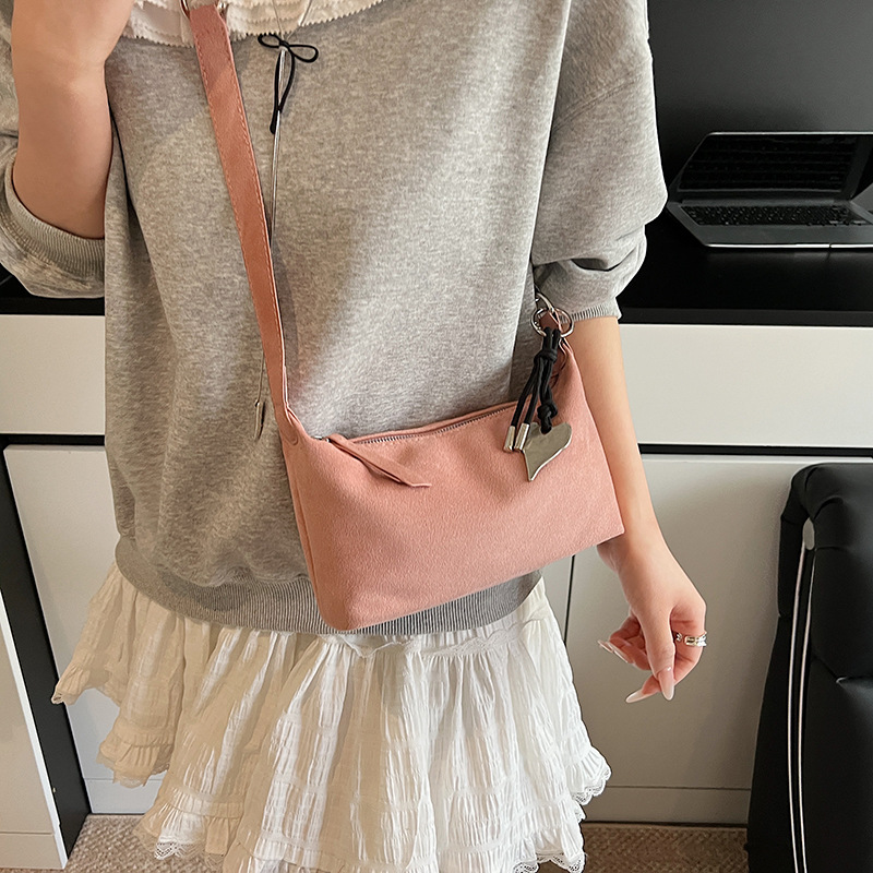 Bolso coreano Hobo mujeres 2026 primavera nuevo simple hombro bolso de brazo bolso de mano casual mochila mate
