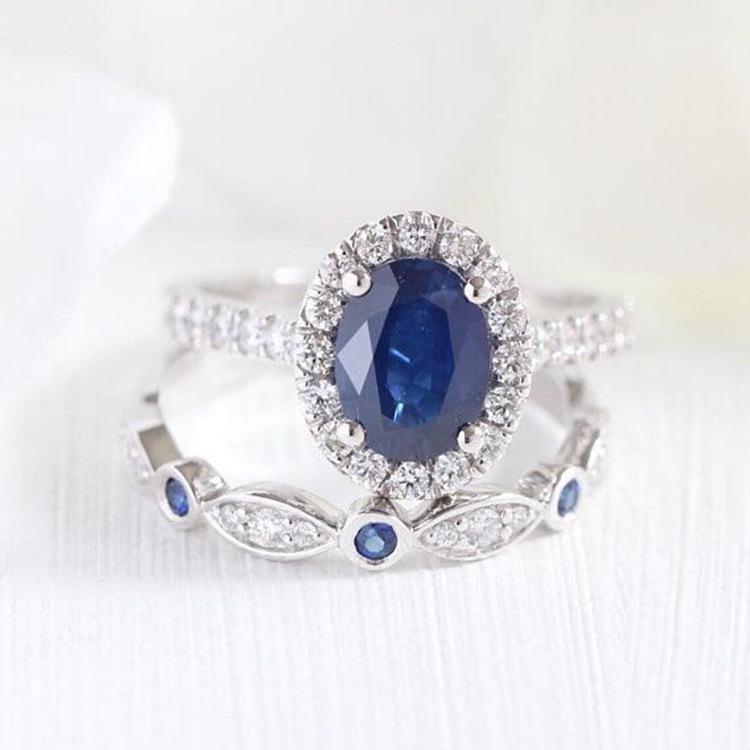 Fashion Egg-shaped Treasure Sapphire Inlaid White Diamond Alloy Ring display picture 1