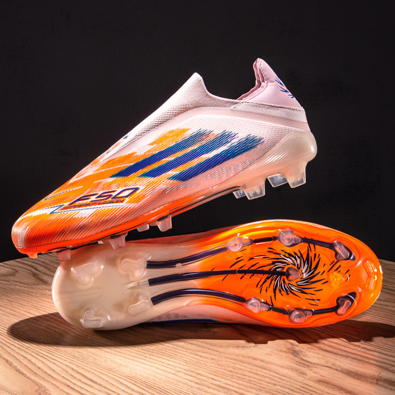 Nuevos zapatos de fútbol juveniles sin costura de tejido sin lazos de entrenamiento de césped profesional zapatos de fútbol transfronterizos al por mayor