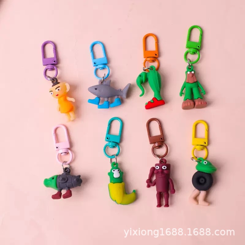 Colgante de hombre de palo de madera transfronterizo Douyin Hot Terrier versión extranjera de Shanhaijing llavero divertido mano abstracta caja ciega accesorios