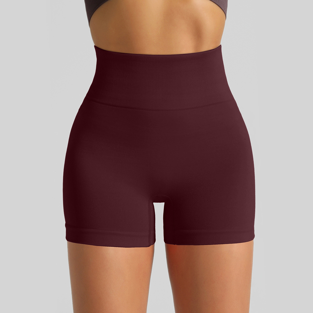 Pantalones cortos de Yoga de punto sin costuras transfronterizas Peach Hip lifting pantalones de fitness de cintura alta pantalones cortos deportivos para correr tres puntos mujeres