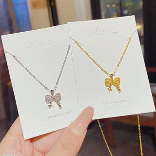 个性流星心愿蝴蝶结项链新款轻奢精致吊坠小众设计钛钢锁骨链配饰