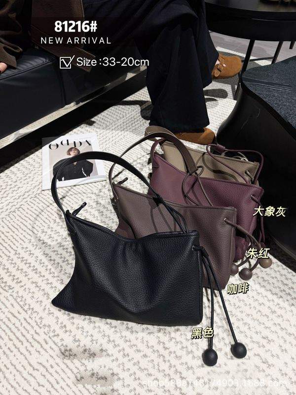 泡泡纹真皮腋下牛角包女2025新款休闲慵懒松弛感单肩包斜挎饺子包|undefined