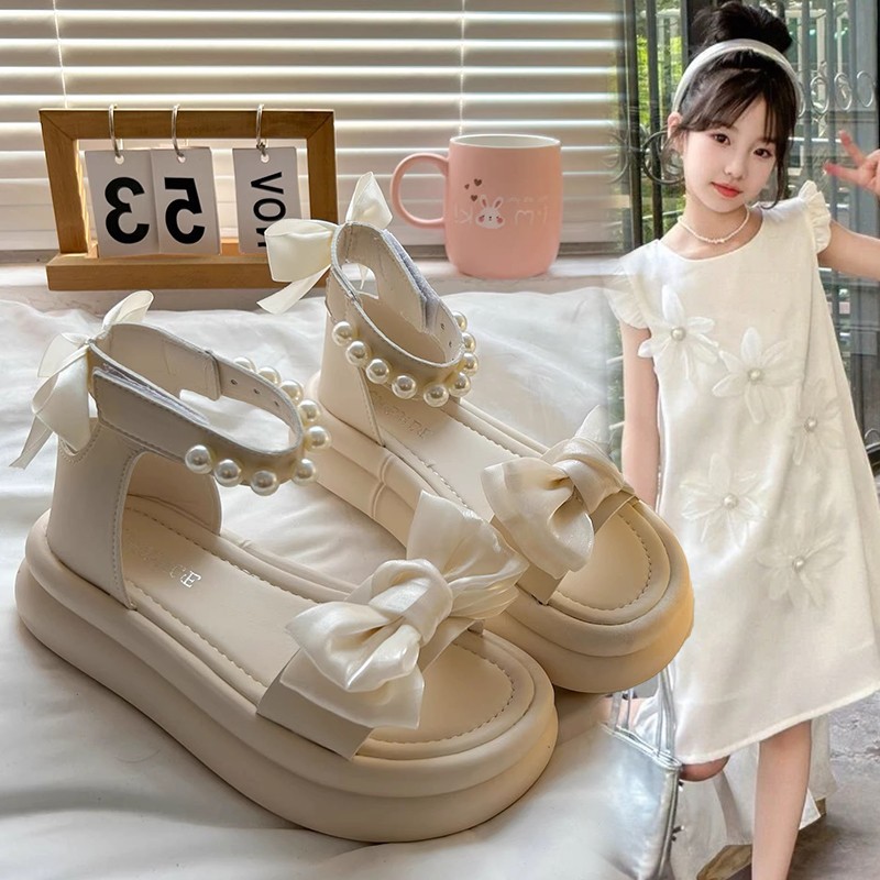 Sandalias para niñas Zapatos de princesa con lazo de perlas 2025 verano nuevos zapatos de playa para niños sandalias de fondo suave para niñas marea image 4