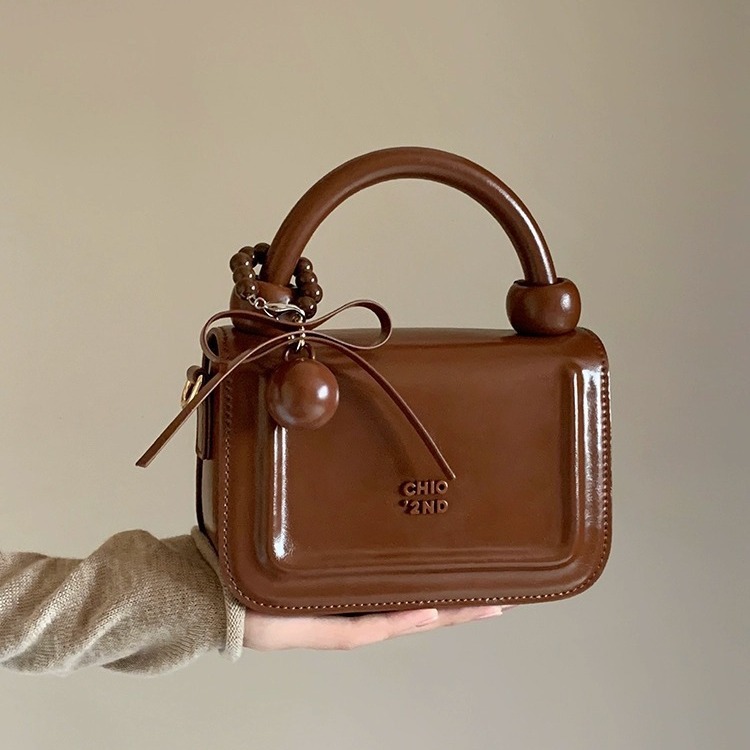 Nanfeng Chio2nd Sweet Paradise Small Square B, a niche designer's exquisite hand-held b, single shoulder crossbody_voghion.com