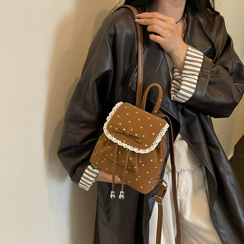Korean-style high-fashion backpack with unique design, niche women's backpack, campus lace-trimmed mini stylish polka dot school bag Korean-style high-fashion backpack with unique design, niche women's backpack, campus lace-trimmed mini stylish polka dot school bag